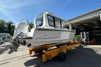 2022 Nimbus C8 boat on trailer in sunny outdoor setting.