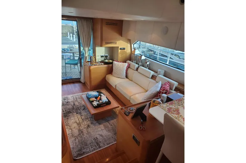  Yacht Photos Pics Luxurious interior of 2009 Aicon 64 yacht with elegant seating and decor.