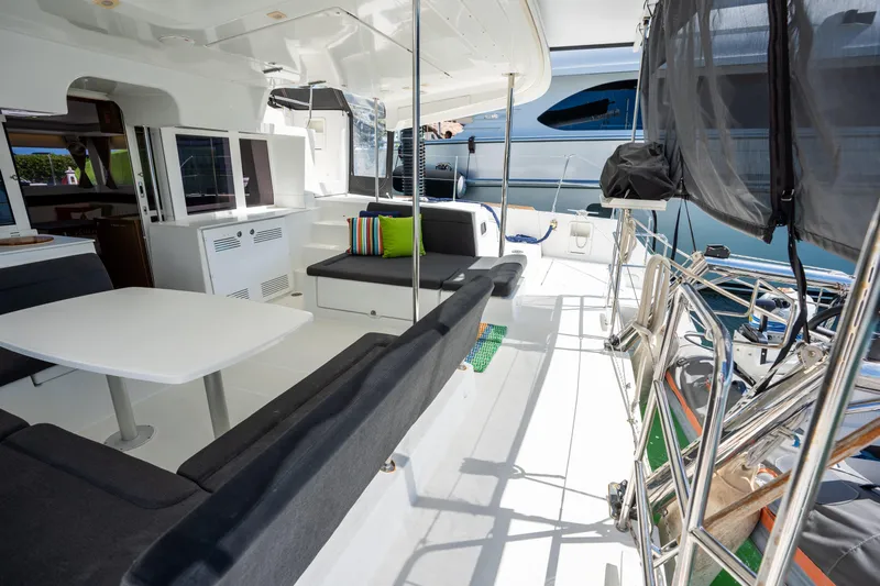  Yacht Photos Pics Spacious deck of 2019 Lagoon 450 F catamaran with seating and table.
