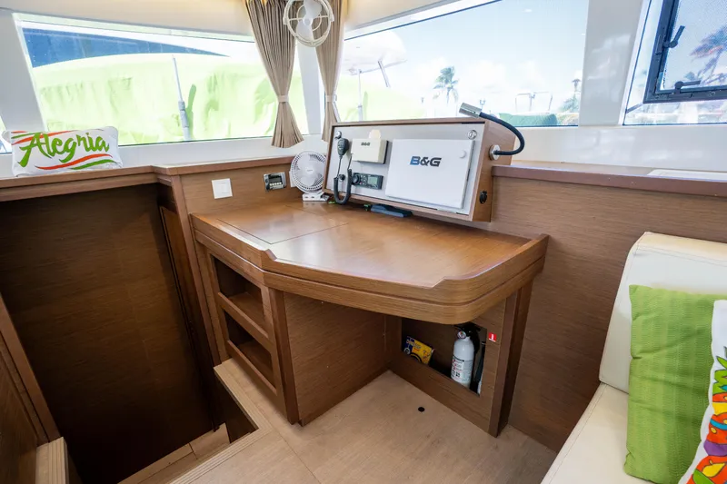  Yacht Photos Pics Navigation station inside 2019 Lagoon 450 F catamaran with B&G equipment and wooden finish.