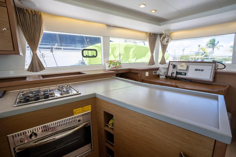  Yacht Photos Pics Interior of 2019 Lagoon 450 F yacht kitchen with stove and oven.