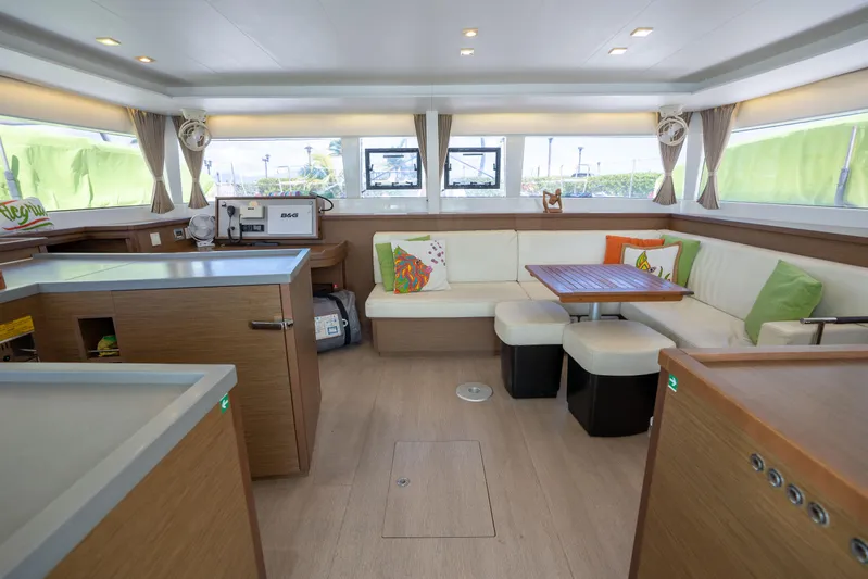  Yacht Photos Pics Interior of 2019 Lagoon 450 F catamaran with modern seating and dining area.