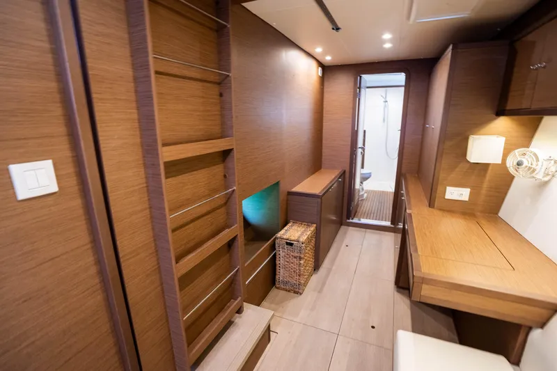  Yacht Photos Pics Interior of 2019 Lagoon 450 F yacht, featuring wooden cabinetry and modern design.