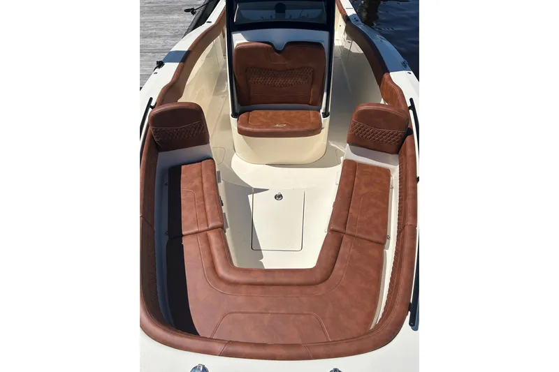  Yacht Photos Pics 2025 Scout 277 LXF boat interior with luxurious brown leather seating.
