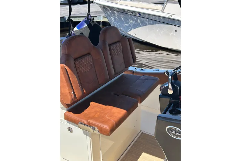  Yacht Photos Pics 2025 Scout 277 LXF boat with luxurious brown leather seating.