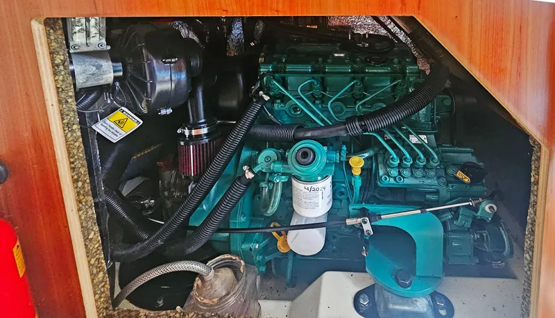 Acadia Yacht Photos Pics Engine compartment of a 2016 Hanse 415 sailboat, showcasing detailed mechanical components.