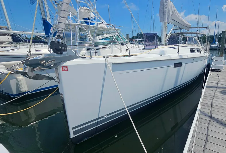 Acadia Yacht Photos Pics 2016 Hanse 415 sailboat docked at marina under clear blue sky.