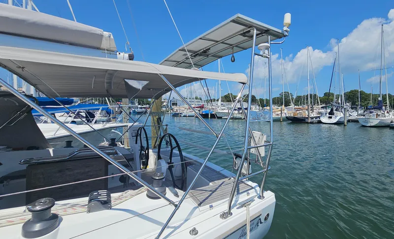 Acadia Yacht Photos Pics 2016 Hanse 415 sailboat docked in a marina under a clear blue sky.
