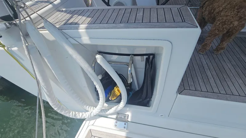 Acadia Yacht Photos Pics 2016 Hanse 415 yacht deck with storage compartment and coiled ropes.