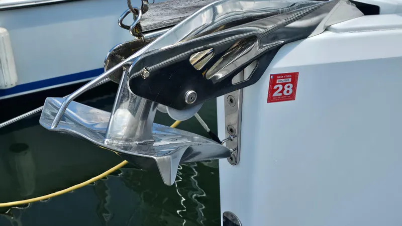 Acadia Yacht Photos Pics Close-up of a 2016 Hanse 415 boat anchor with New York registration sticker.