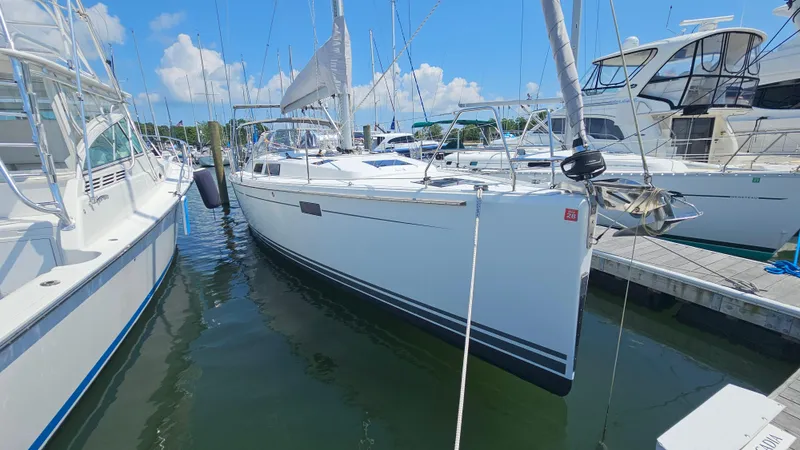 Acadia Yacht Photos Pics 2016 Hanse 415 sailboat docked at marina under clear blue sky.