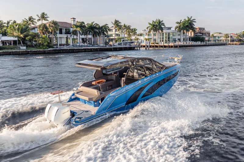  Yacht Photos Pics Luxury Hanover 347 boat cruising near waterfront homes, 2026 model.