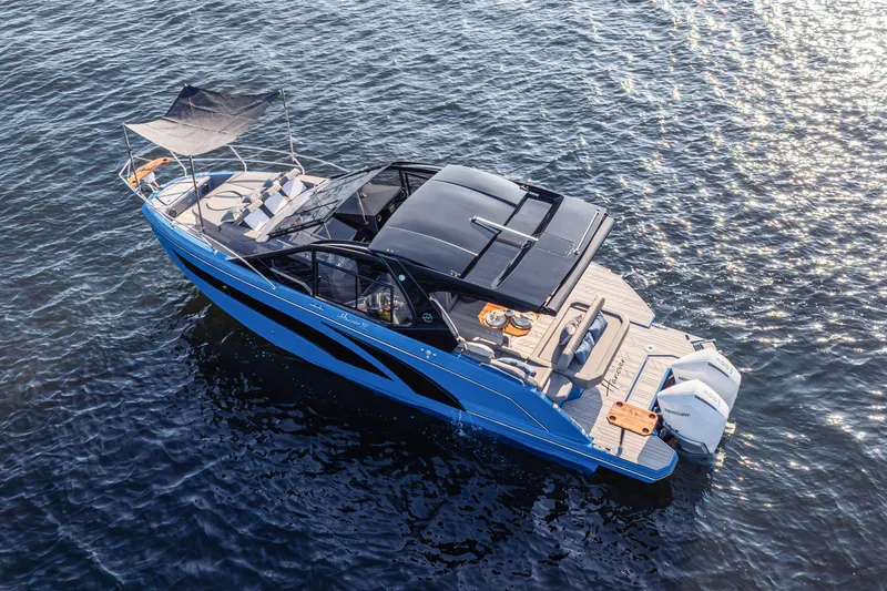  Yacht Photos Pics 2026 Hanover 347 boat on water, featuring sleek design and modern amenities.