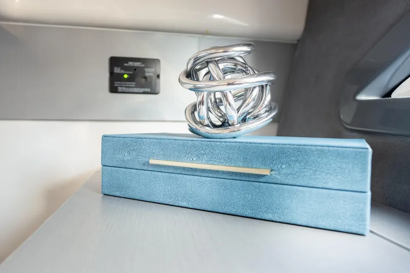  Yacht Photos Pics Silver sculpture on blue box inside Hanover 347, 2026 model.