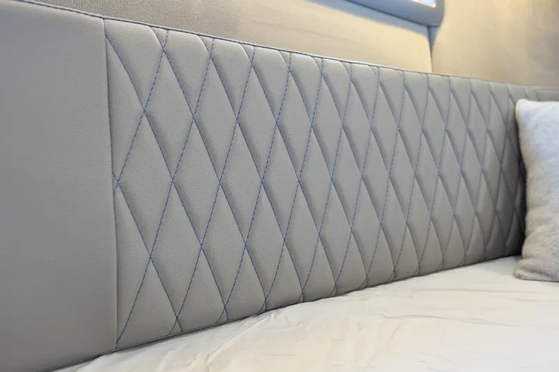  Yacht Photos Pics Quilted leather headboard in Hanover 347, 2026 model, with elegant diamond stitching.