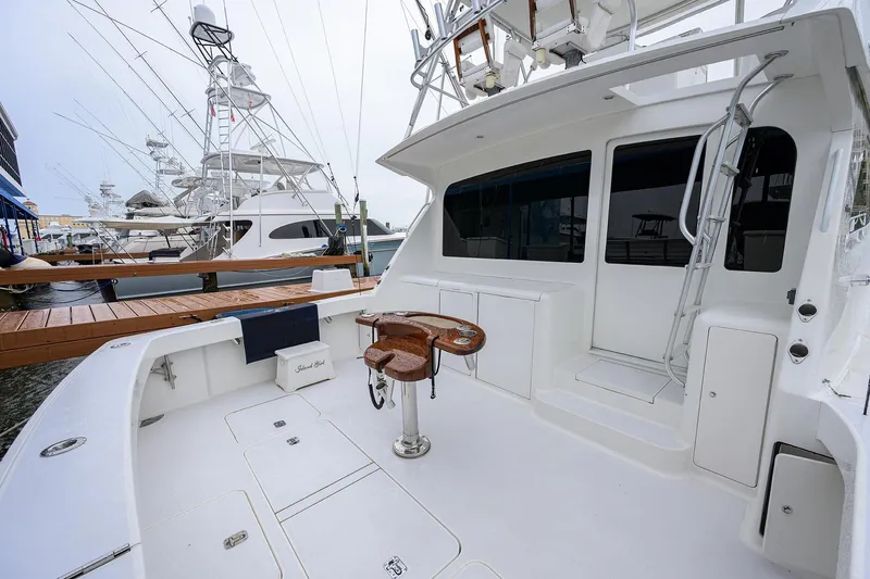 Island Girl Yacht Photos Pics 2004 Viking 48 Convertible yacht with spacious deck and fishing chair.