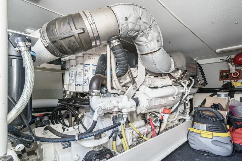 Nauti Pops Yacht Photos Pics Engine room of a 2007 Silverton Convertible yacht, featuring a Volvo Penta engine.