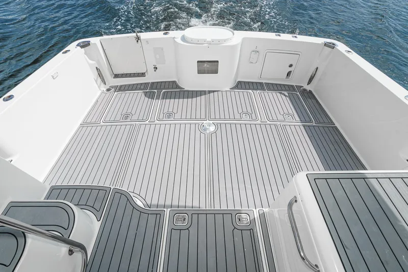 Nauti Pops Yacht Photos Pics 2007 Silverton Convertible boat deck with sleek, modern design on open water.