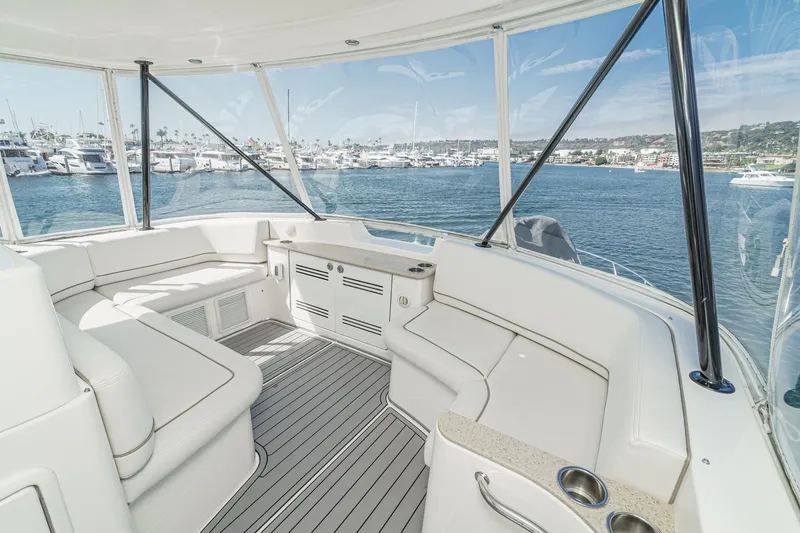 Nauti Pops Yacht Photos Pics Luxurious 2007 Silverton Convertible yacht interior with panoramic marina view.