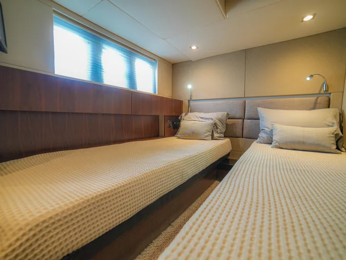 Yolo Yacht Photos Pics Luxurious twin cabin interior of 2014 Fairline 50 yacht with modern lighting.