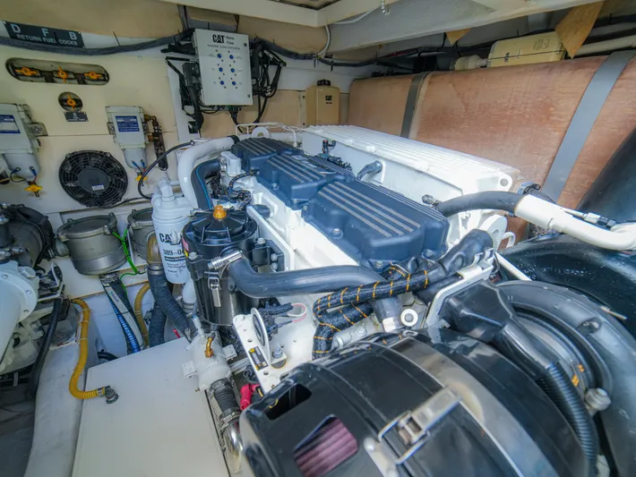 Yolo Yacht Photos Pics Engine room of 2014 Fairline 50 yacht, showcasing detailed mechanical components.