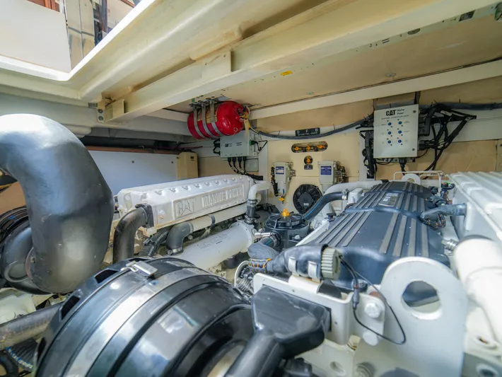 Yolo Yacht Photos Pics Engine room of 2014 Fairline 50 yacht, showcasing mechanical components and systems.