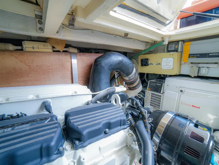 Yolo Yacht Photos Pics Engine room of 2014 Fairline 50 yacht, showcasing mechanical components and systems.