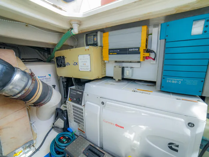 Yolo Yacht Photos Pics Engine room of 2014 Fairline 50 yacht with various equipment and machinery.