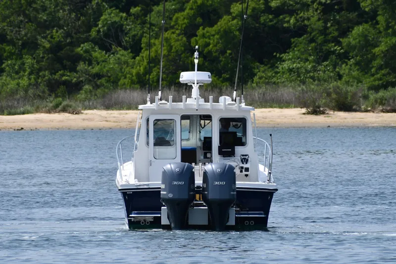  Yacht Photos Pics 2021 Steiger Craft 31 Chesapeake boat with dual engines on water.