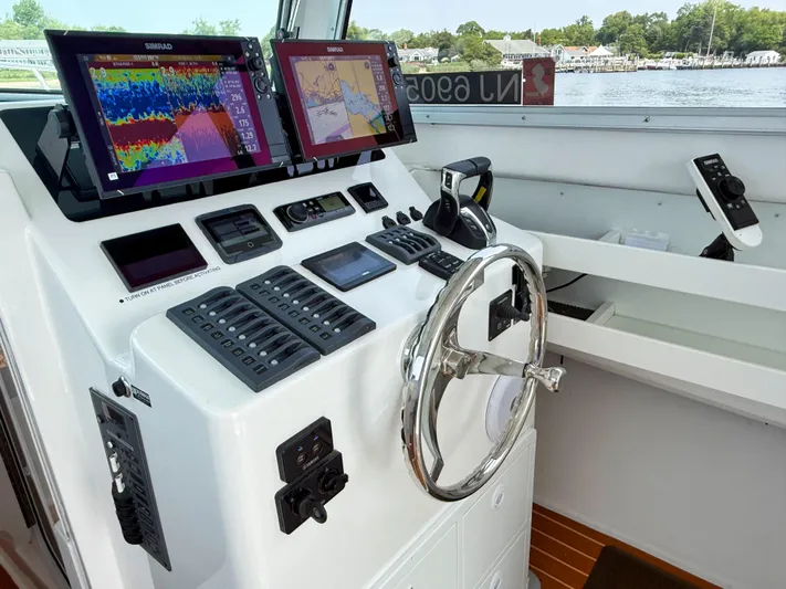  Yacht Photos Pics 2021 Steiger Craft 31 Chesapeake helm with advanced navigation displays and controls.