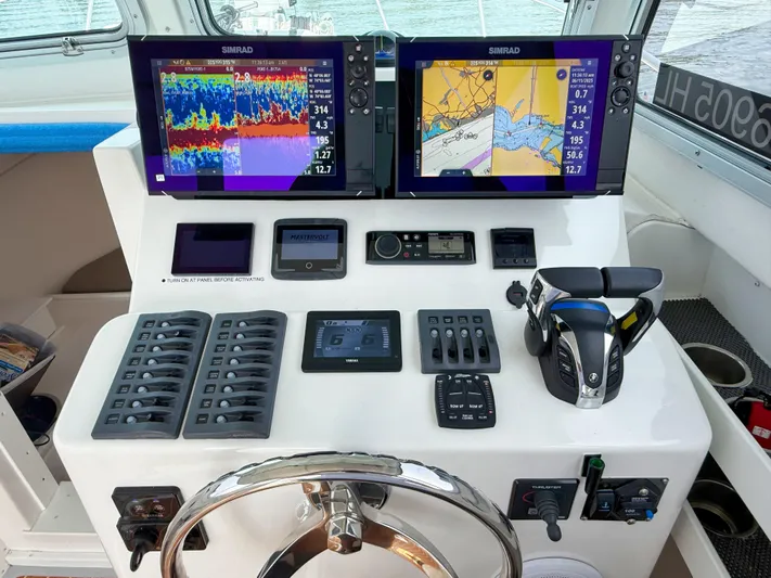  Yacht Photos Pics Control panel of 2021 Steiger Craft 31 Chesapeake boat with navigation and monitoring systems.