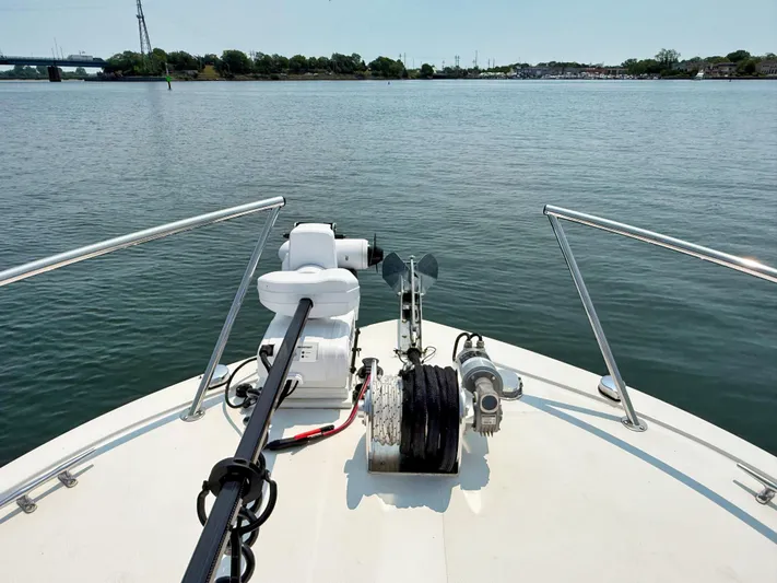 Yacht Photos Pics Bow view of 2021 Steiger Craft 31 Chesapeake on calm water.