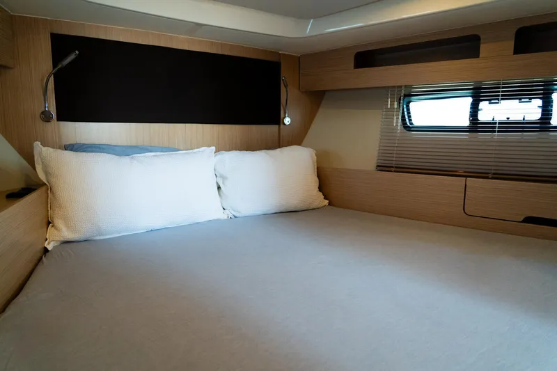  Yacht Photos Pics Interior cabin of 2022 Bavaria SR41 yacht with cozy bed and modern design.