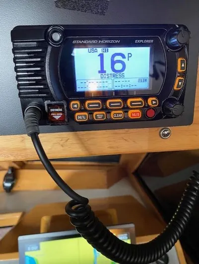  Yacht Photos Pics Standard Horizon Explorer marine radio on 1989 Ocean Alexander 42, displaying channel 16 distress signal.
