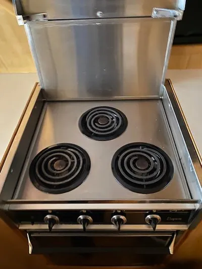  Yacht Photos Pics Stainless steel three-burner stove on 1989 Ocean Alexander 42 yacht.