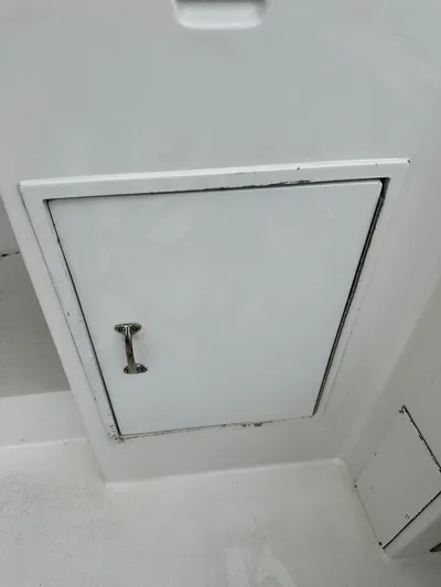 Billie Jo Yacht Photos Pics White storage compartment on 1994 Hatteras 46 Convertible boat.