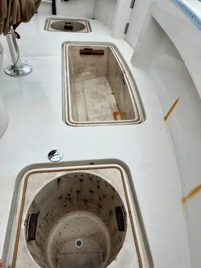 Billie Jo Yacht Photos Pics 1994 Hatteras 46 Convertible boat deck with storage compartments.