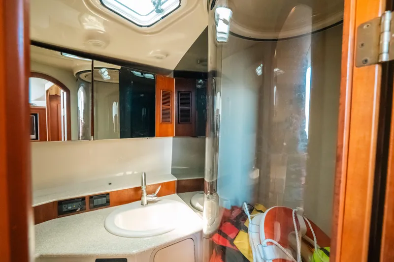  Yacht Photos Pics Luxurious bathroom interior of 2007 Rampage 38 Express yacht with modern amenities.