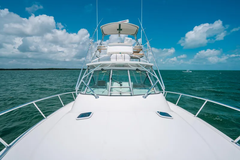  Yacht Photos Pics 2007 Rampage 38 Express boat on open sea under blue sky.