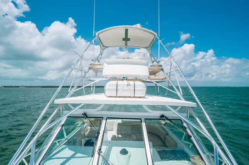  Yacht Photos Pics 2007 Rampage 38 Express yacht on open sea under clear blue sky.