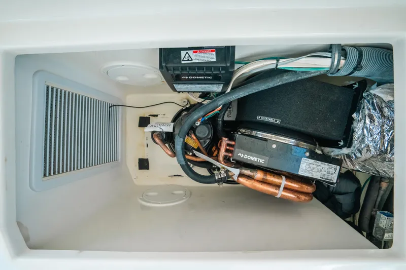  Yacht Photos Pics 2007 Rampage 38 Express engine compartment with wiring and components.