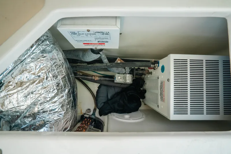  Yacht Photos Pics 2007 Rampage 38 Express engine compartment with wiring and insulation.