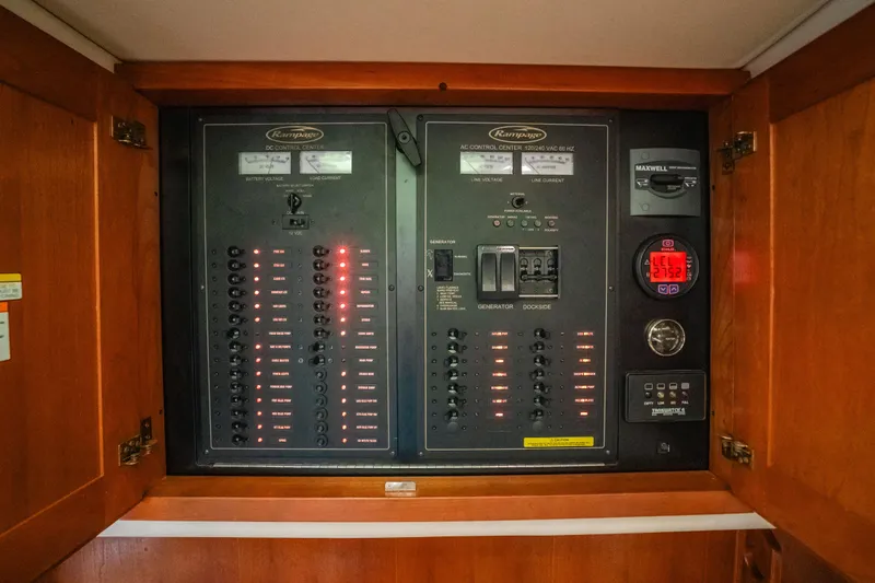  Yacht Photos Pics Electrical panel of a 2007 Rampage 38 Express boat, featuring switches and indicators.