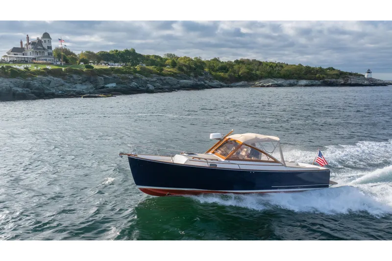 Eloise Yacht Photos Pics 2020 CH Marine Shelter Island Nomad cruising near scenic coastline.