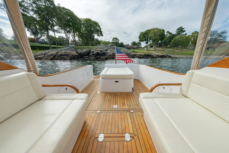 Eloise Yacht Photos Pics 2020 CH Marine Shelter Island Nomad boat interior with wooden deck and seating.