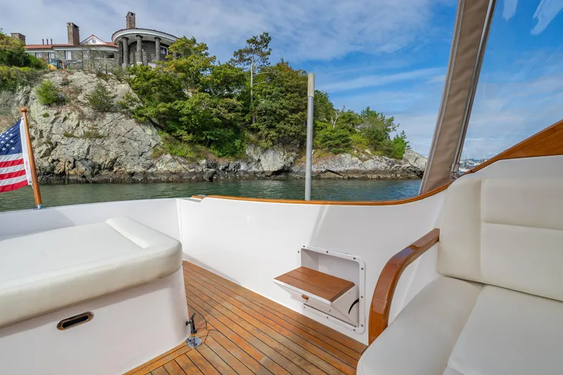 Eloise Yacht Photos Pics 2020 CH Marine Shelter Island Nomad boat interior with scenic coastal view.
