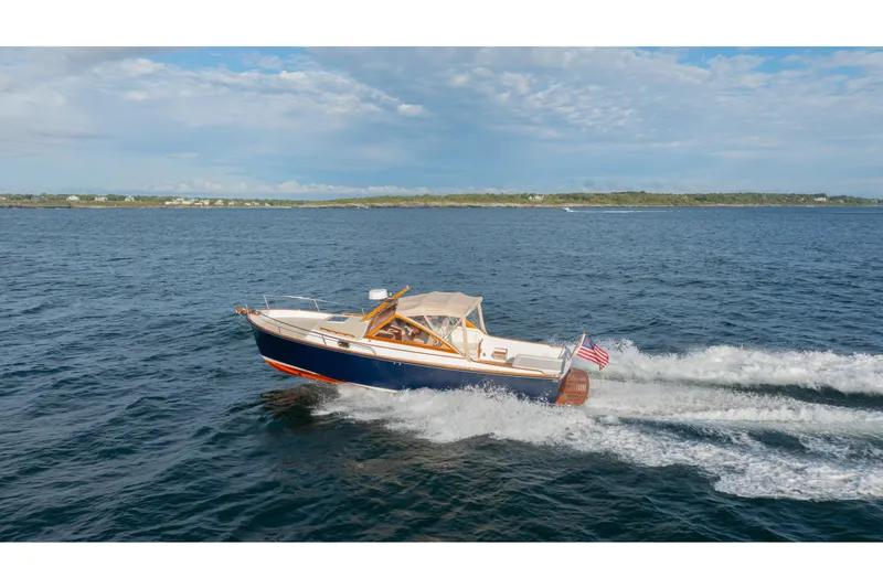 Eloise Yacht Photos Pics 2020 CH Marine Shelter Island Nomad cruising on open water under a clear sky.