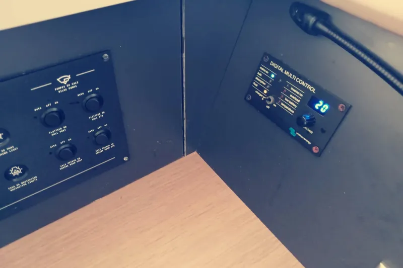  Yacht Photos Pics Control panels on 2021 Bali Catamarans 4.8, featuring digital multi-control and bilge pump switches.