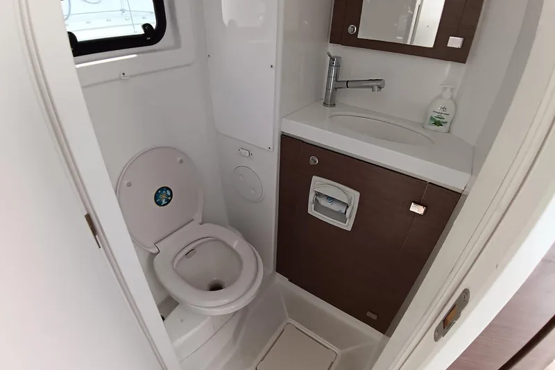  Yacht Photos Pics Bathroom interior of 2021 Bali Catamarans 4.8, featuring toilet and sink.