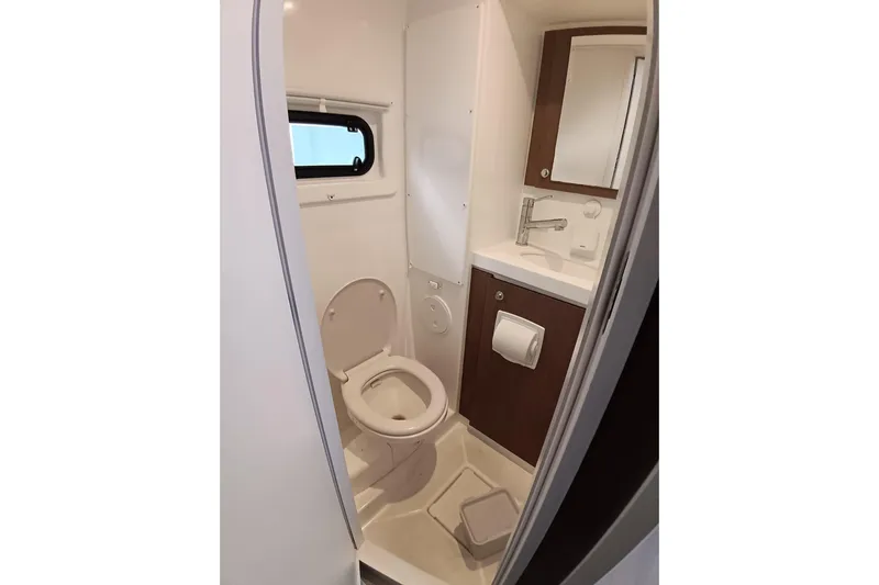  Yacht Photos Pics Bathroom interior of 2021 Bali Catamarans 4.8, featuring toilet and sink.